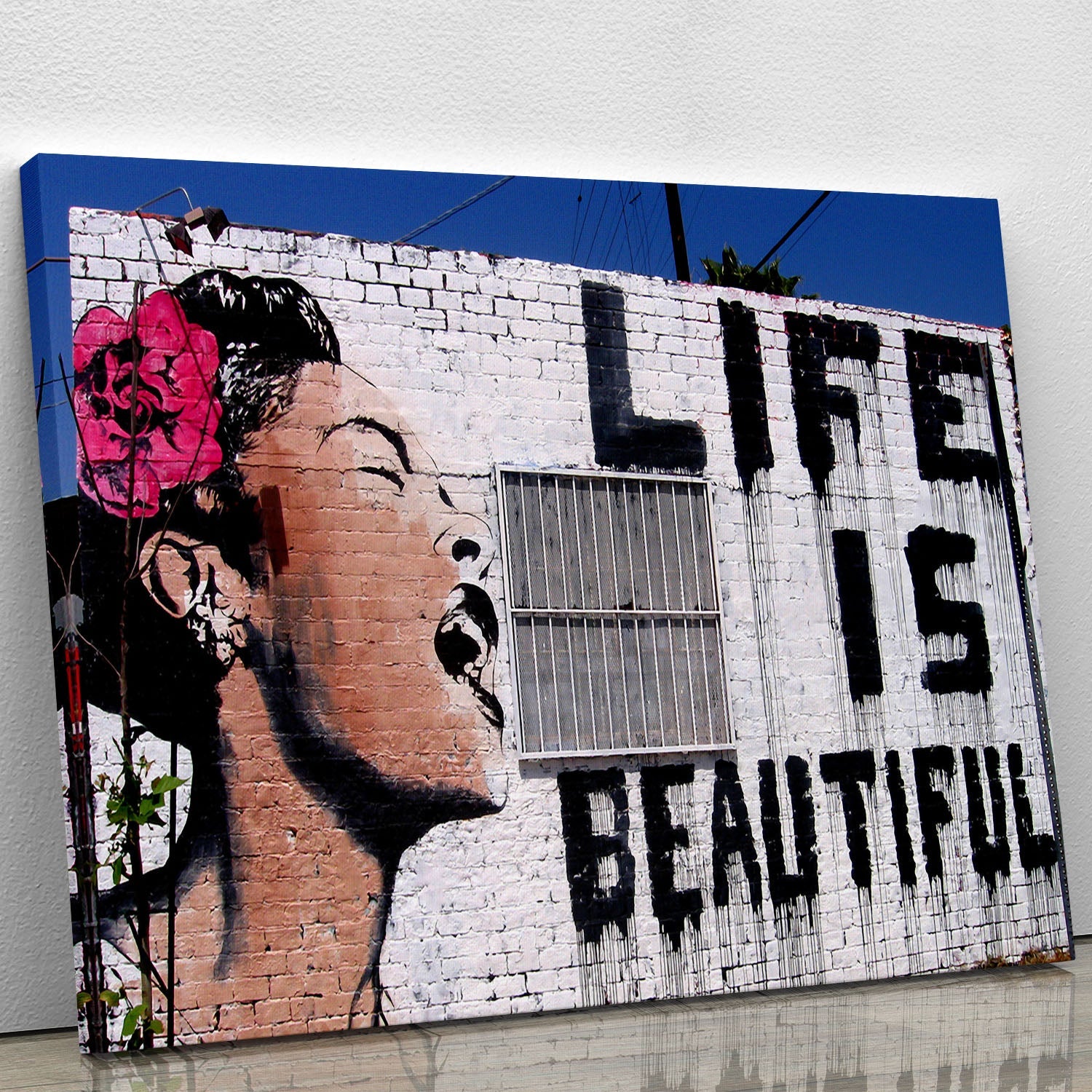 Banksy Life is Beautiful canvas print as bold quote wall art