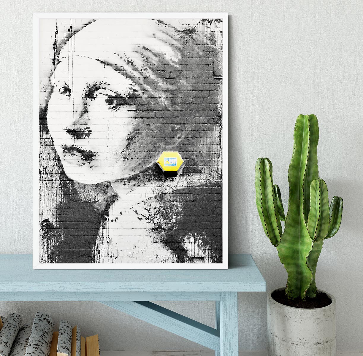 Banksy Girl With a Pierced Eardrum Framed Print