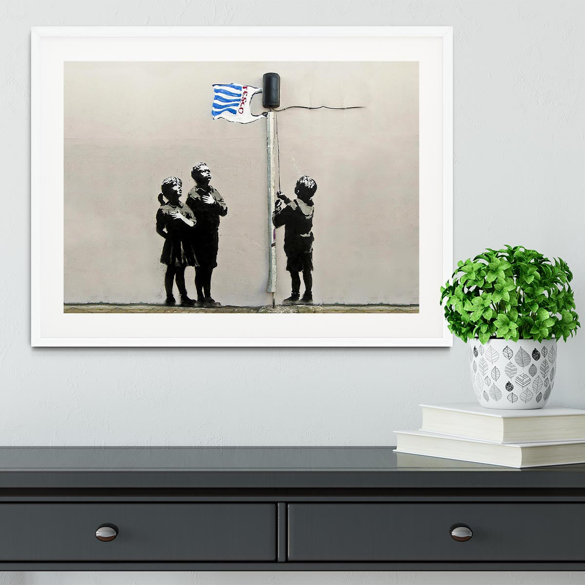 Banksy Raising the Tesco Flag (Very Little Helps) Framed Print