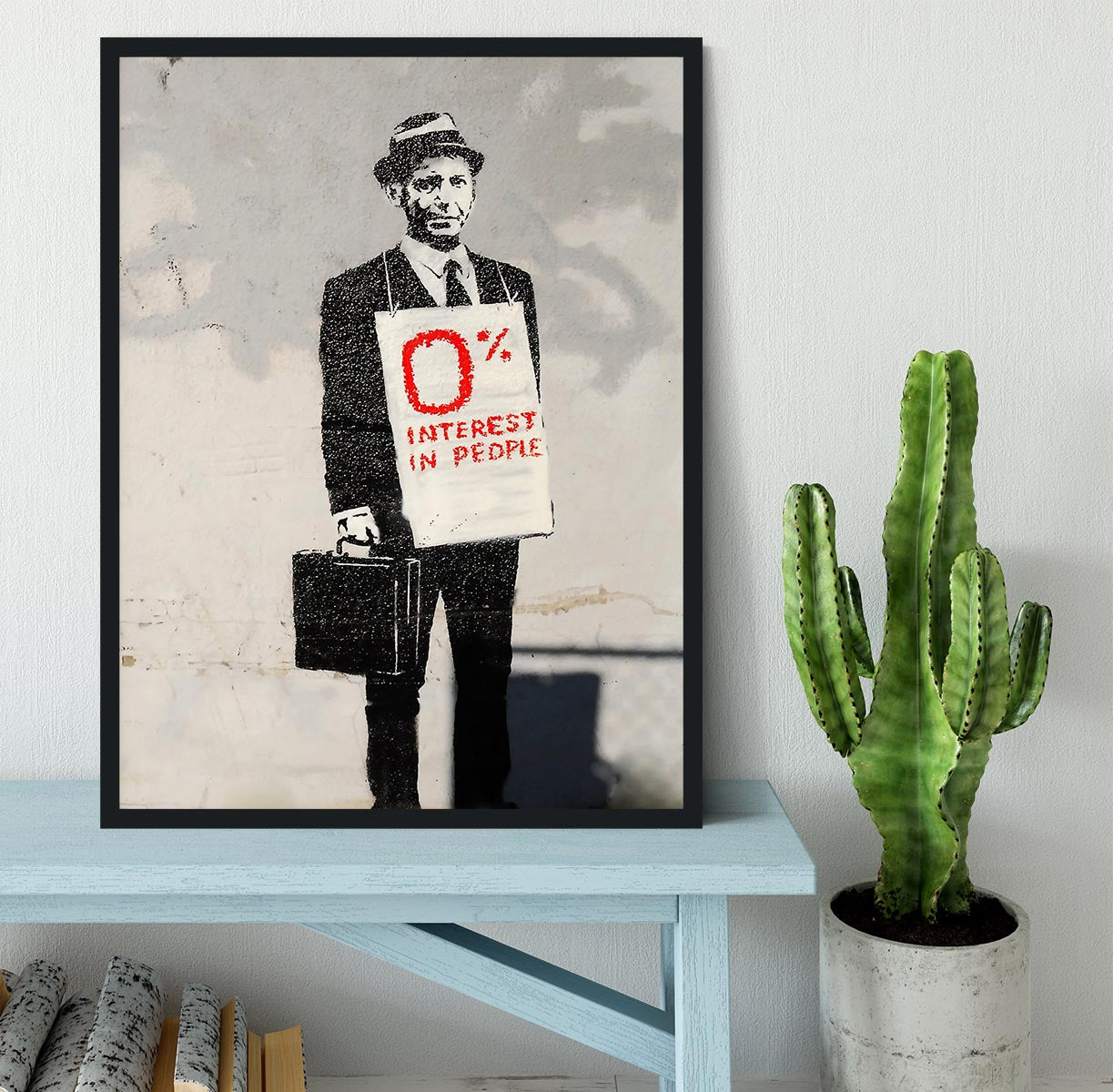 Banksy Zero Per Cent Interest in People Framed Print