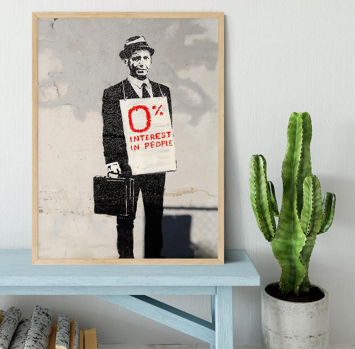 Banksy Zero Per Cent Interest in People Framed Print