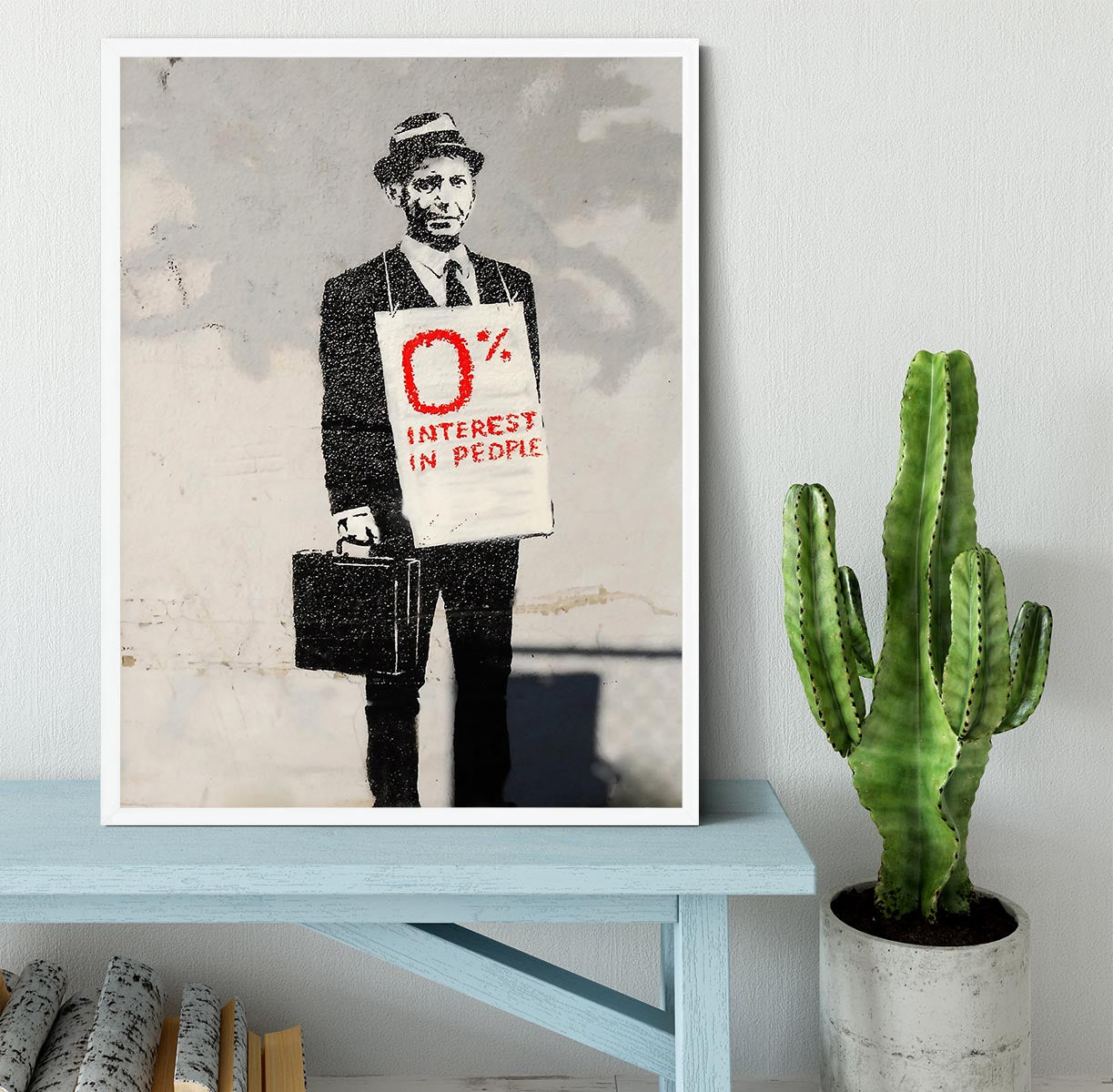 Banksy Zero Per Cent Interest in People Framed Print