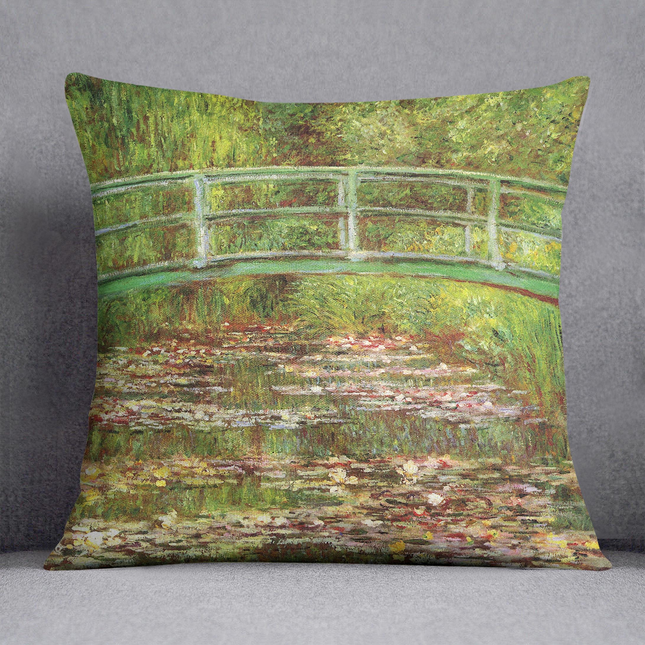 Bridge over the sea rose pond by Monet Cushion