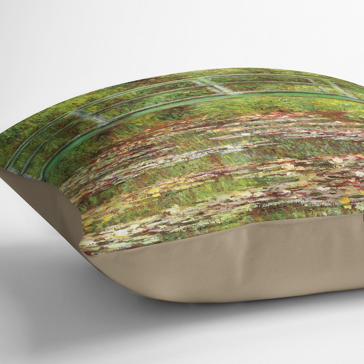 Bridge over the sea rose pond by Monet Cushion