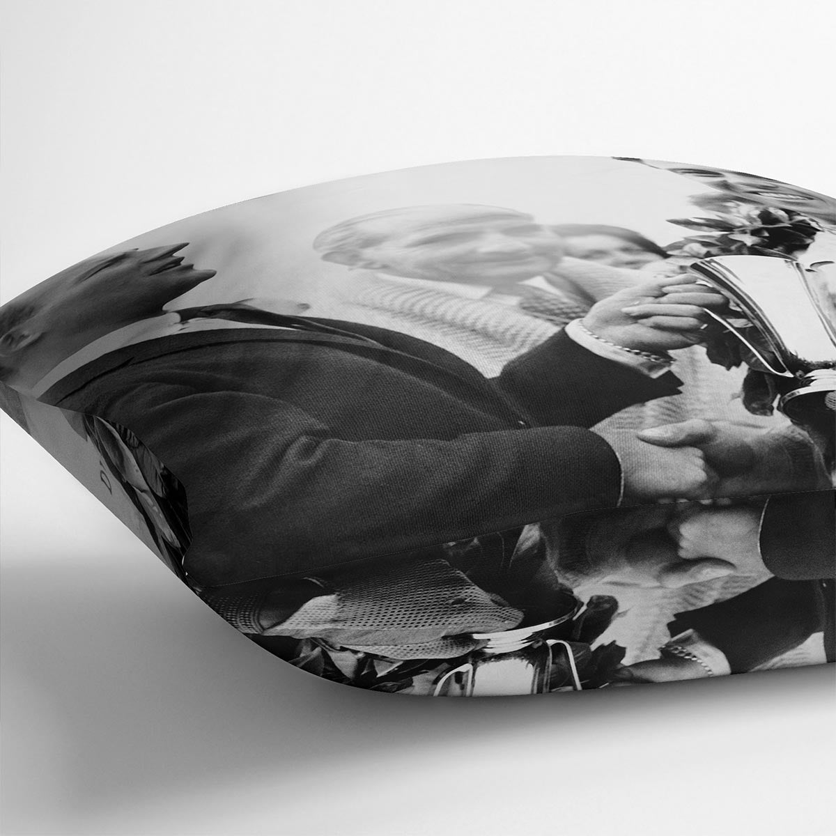 British racing drivers Jim Clark and Stirling Moss Cushion