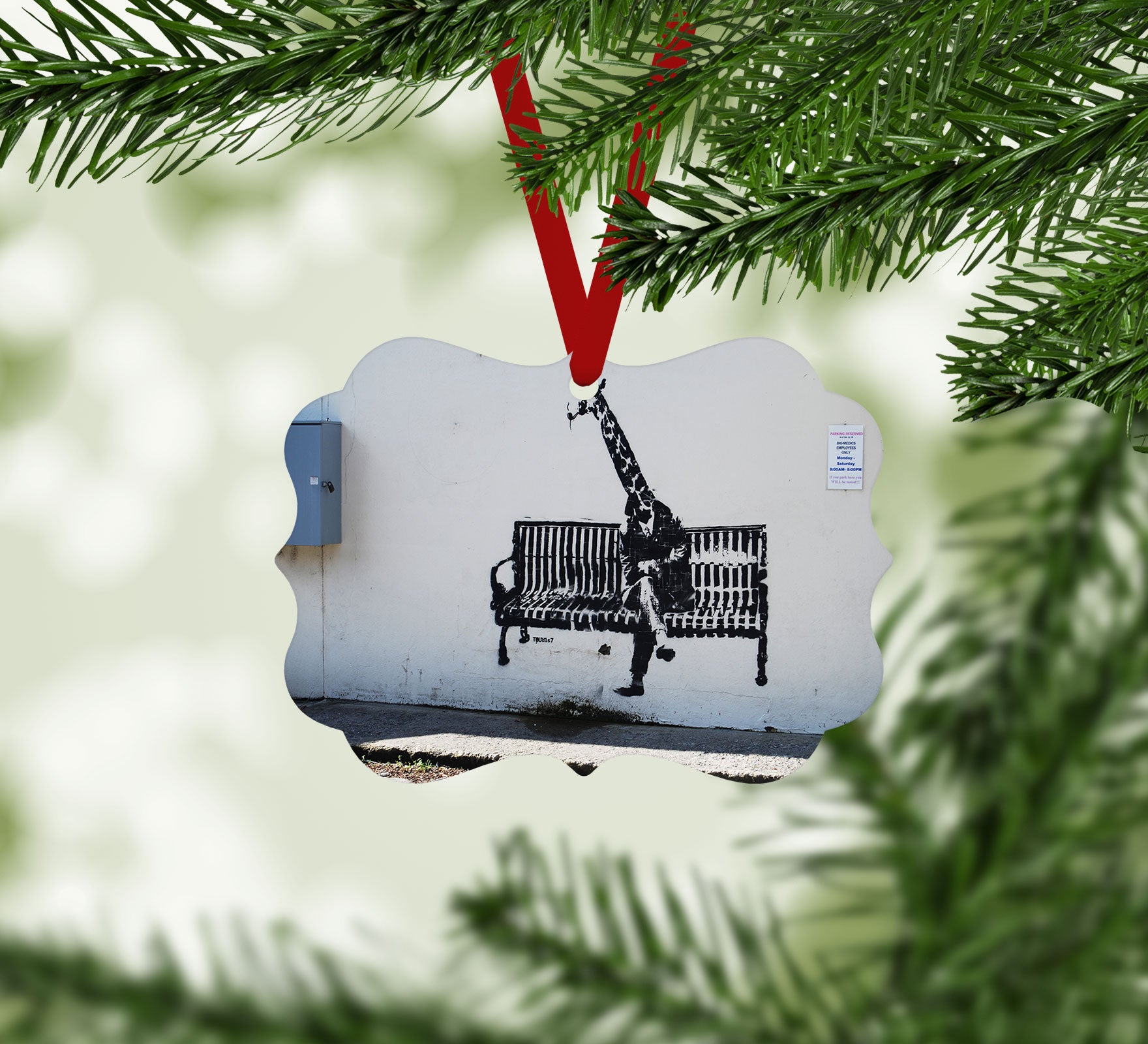 Banksy Giraffe on a Bench Christmas Ornament