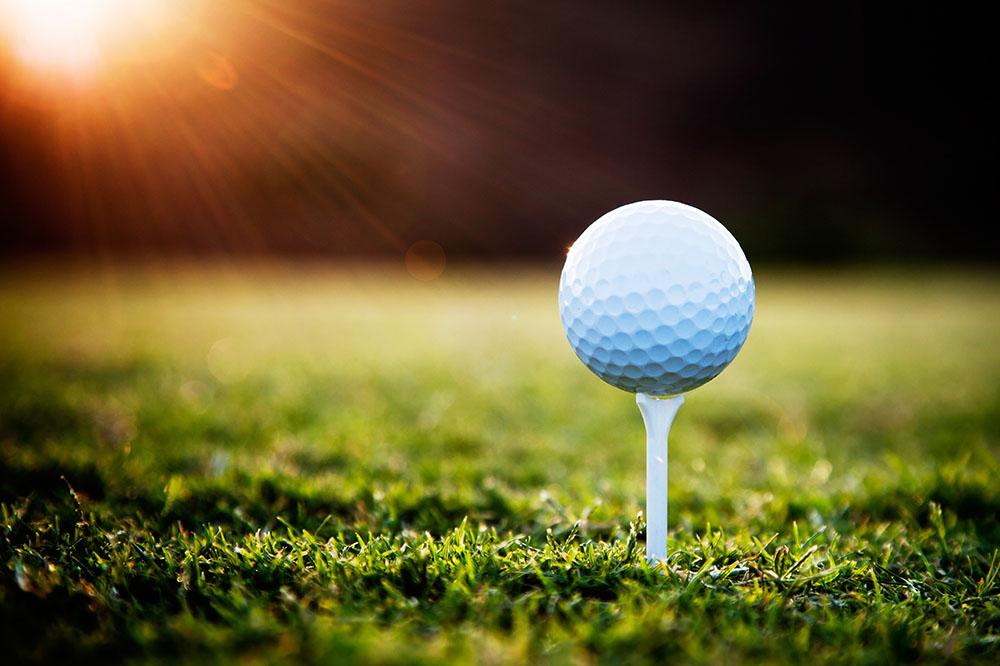 Close up of golf ball on tee Wall Mural Wallpaper - Canvas Art Rocks - 1