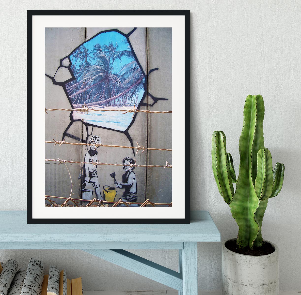 Banksy Finding Paradise Framed Print