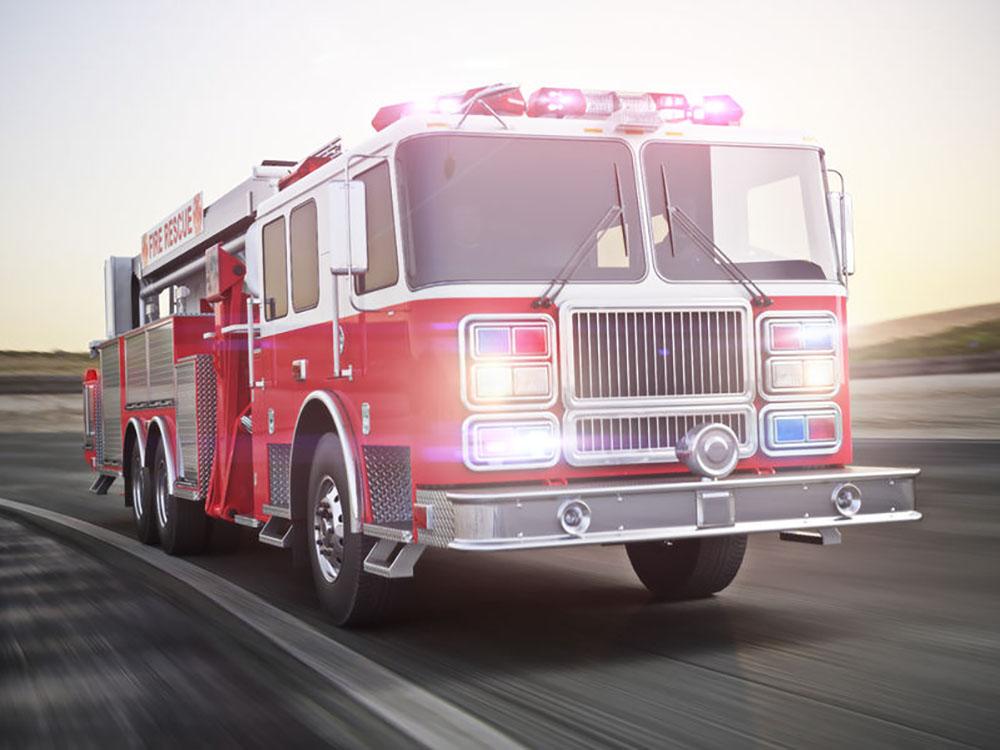 Fire truck running with lights and sirens Wall Mural Wallpaper - Canvas Art Rocks - 1