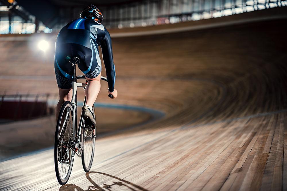 Racing cyclist on velodrome Wall Mural Wallpaper - Canvas Art Rocks - 1