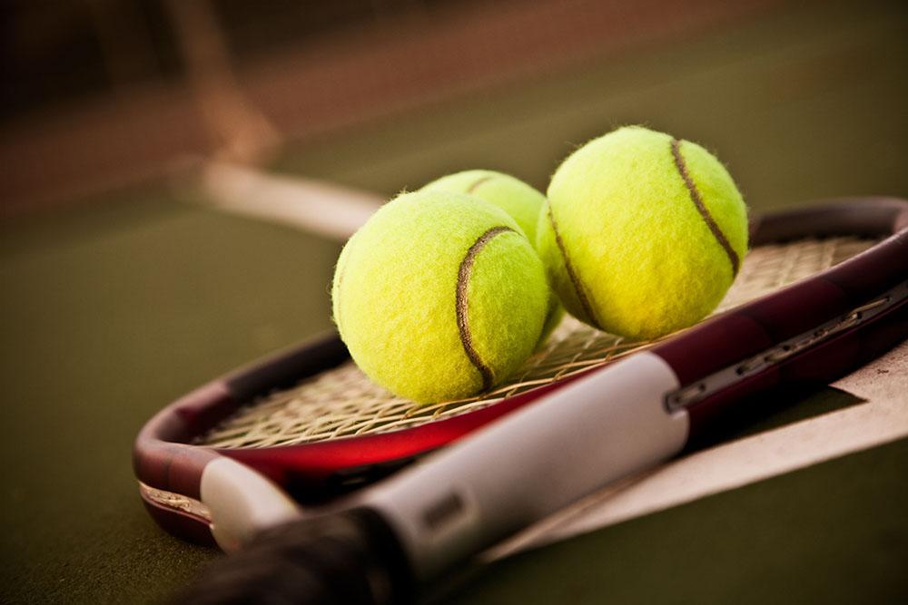 Shot of a tennis racket and tennis balls Wall Mural Wallpaper - Canvas Art Rocks - 1