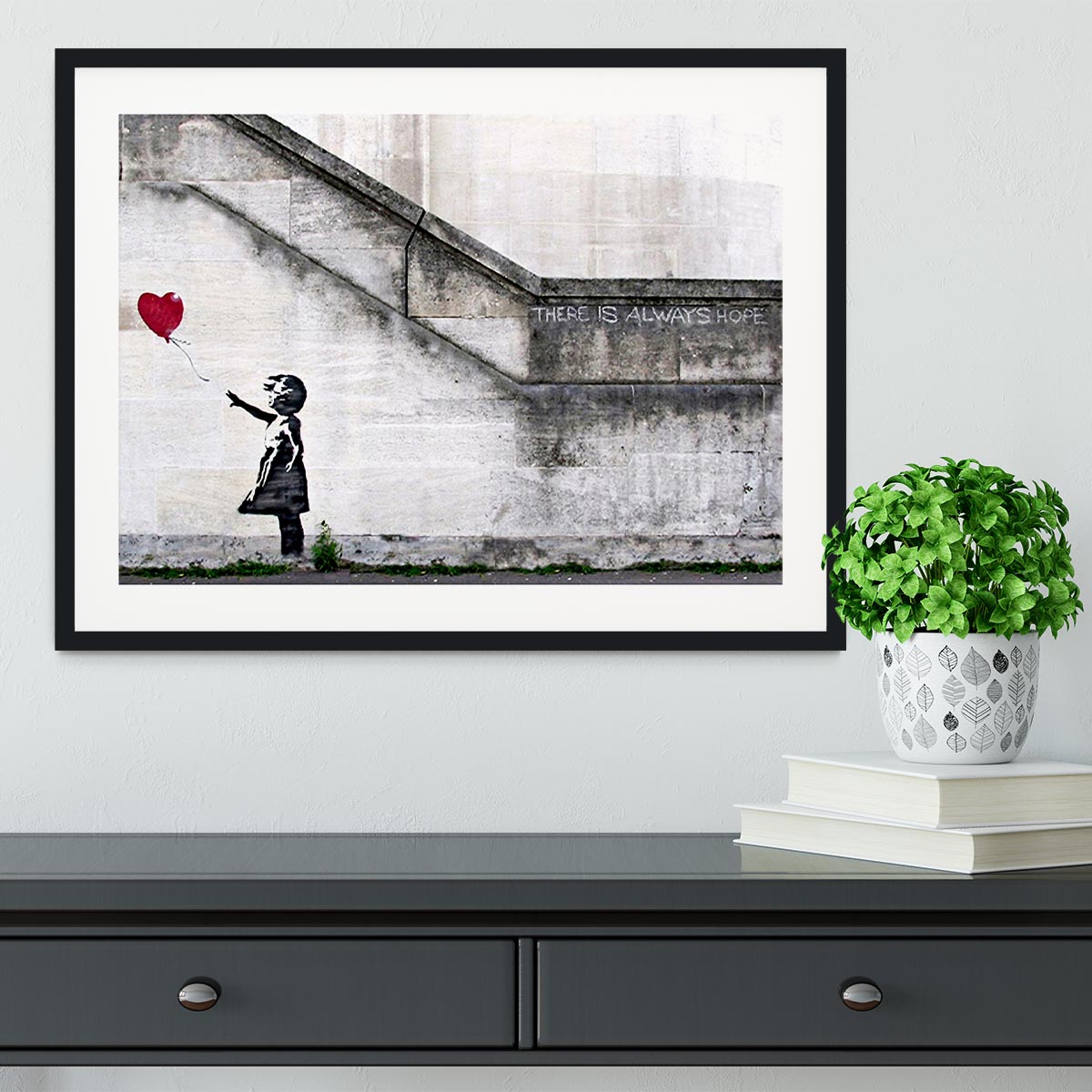 Banksy There is Always Hope framed print as the hero piece for a street art gallery wall