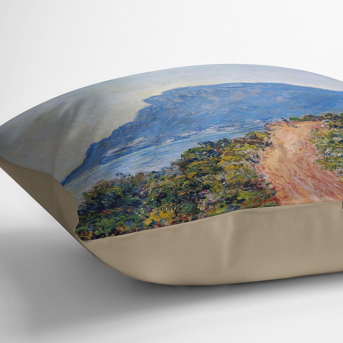A coastal view with a bay by Monet Cushion