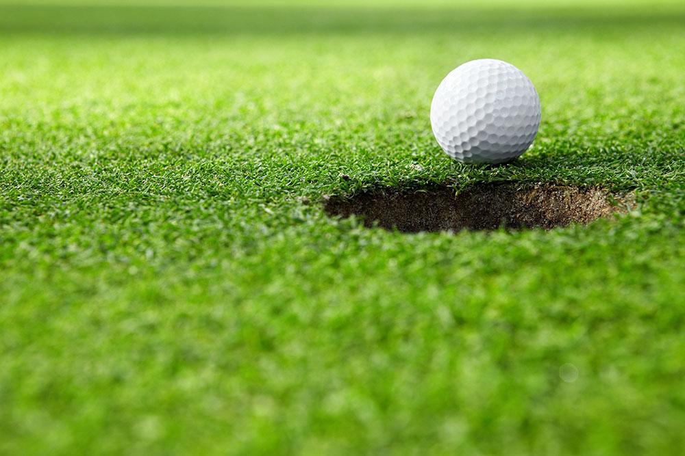 A golf ball at the hole Wall Mural Wallpaper - Canvas Art Rocks - 1