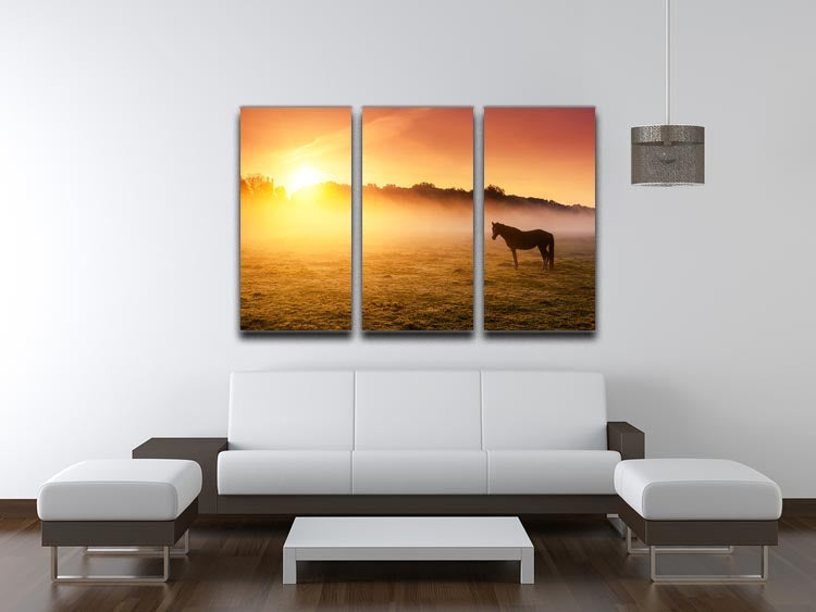 Arabian horses grazing on pasture at sundown in orange sunny beams. Dramatic foggy scene 3 Split Panel Canvas Print - Canvas Art Rocks - 3