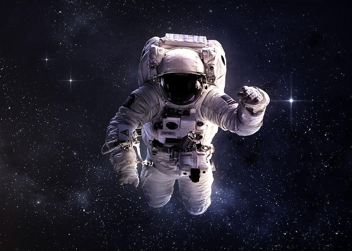 Astronaut in outer space with stars Wall Mural Wallpaper