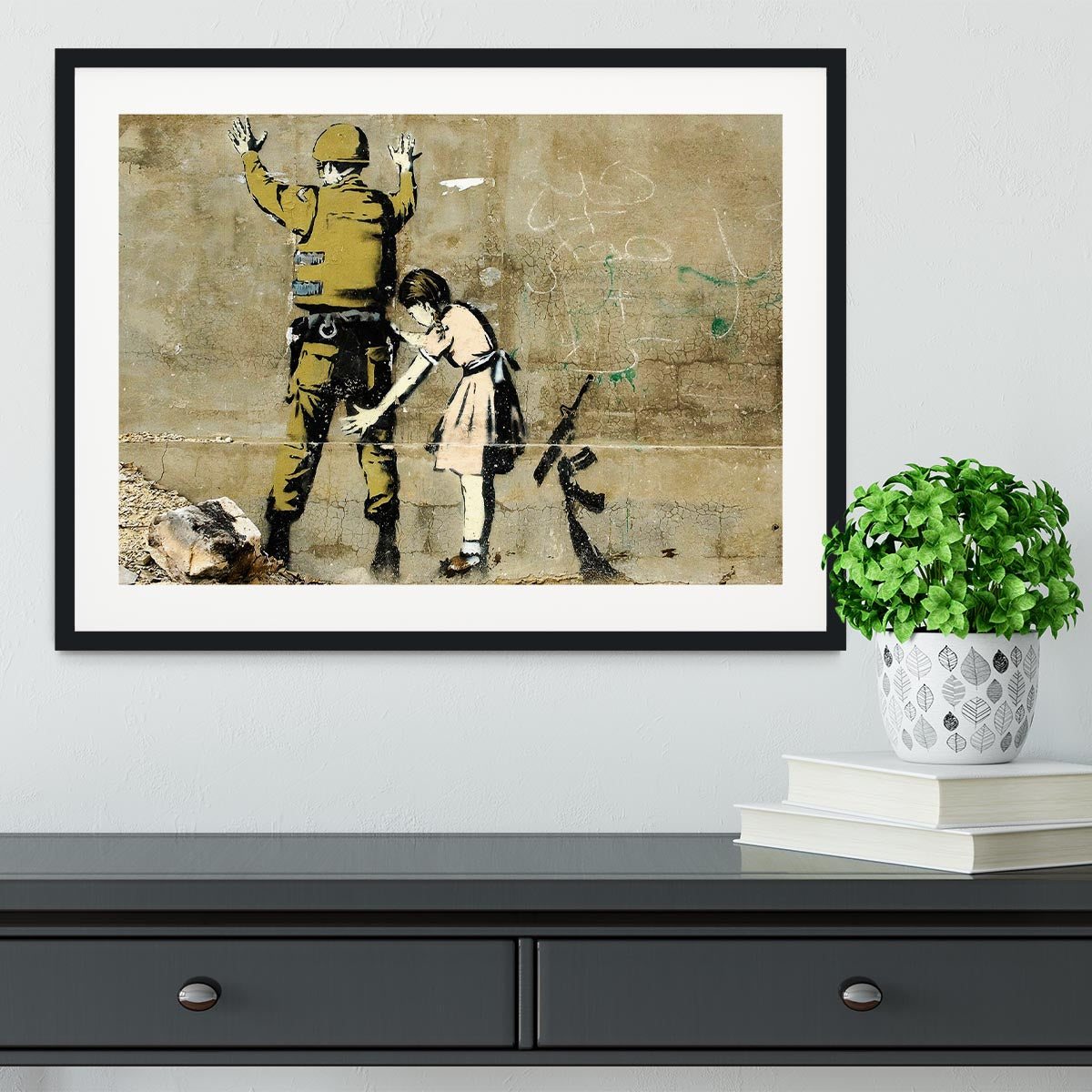 Banksy Girl and Soldier Framed Print