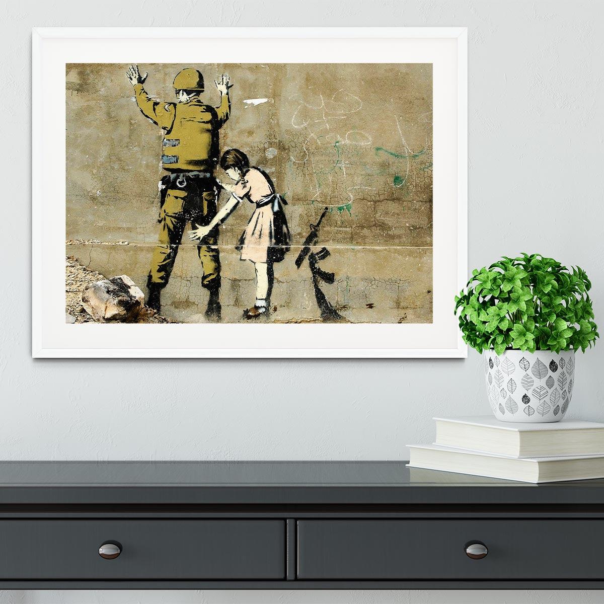 Banksy Girl and Soldier Framed Print