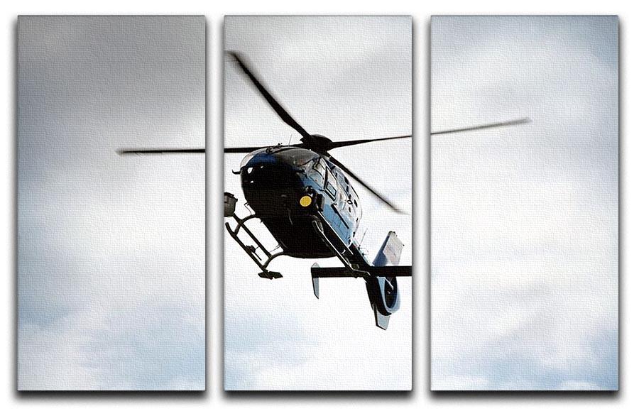 Blue and silver police helicopter flying above 3 Split Panel Canvas Print - Canvas Art Rocks - 1