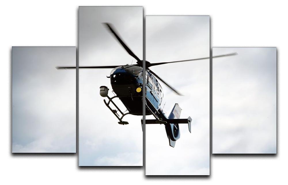 Blue and silver police helicopter flying above 4 Split Panel Canvas  - Canvas Art Rocks - 1