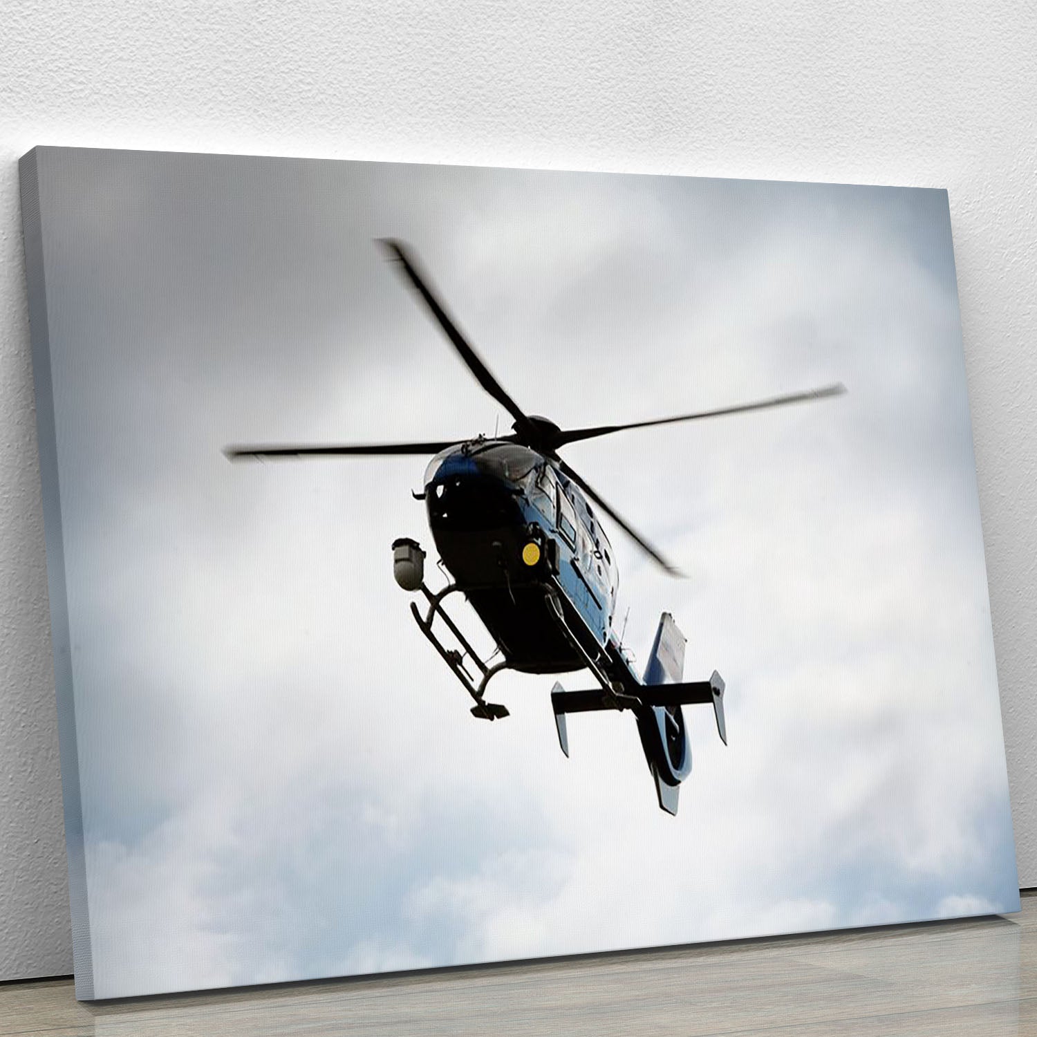 Blue and silver police helicopter flying above Canvas Print or Poster - Canvas Art Rocks - 1