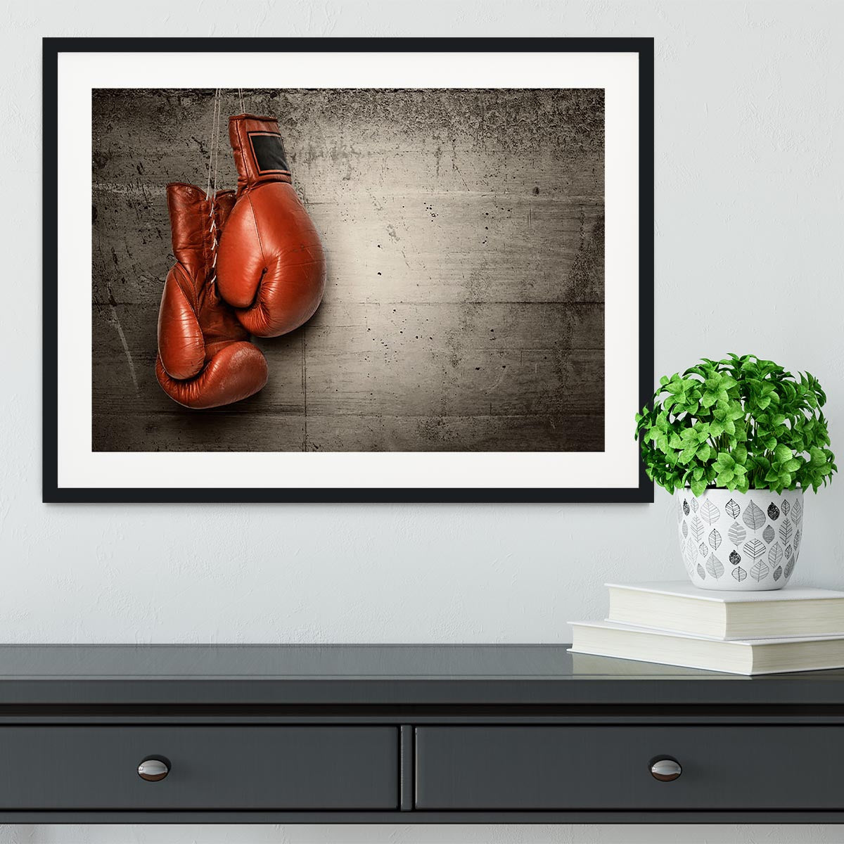 Boxing gloves hanging on concrete Framed Print - Canvas Art Rocks - 1
