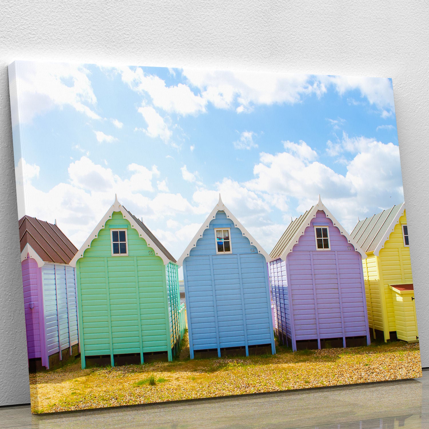 British beach huts on a bright sunny day Canvas Print or Poster - Canvas Art Rocks - 1