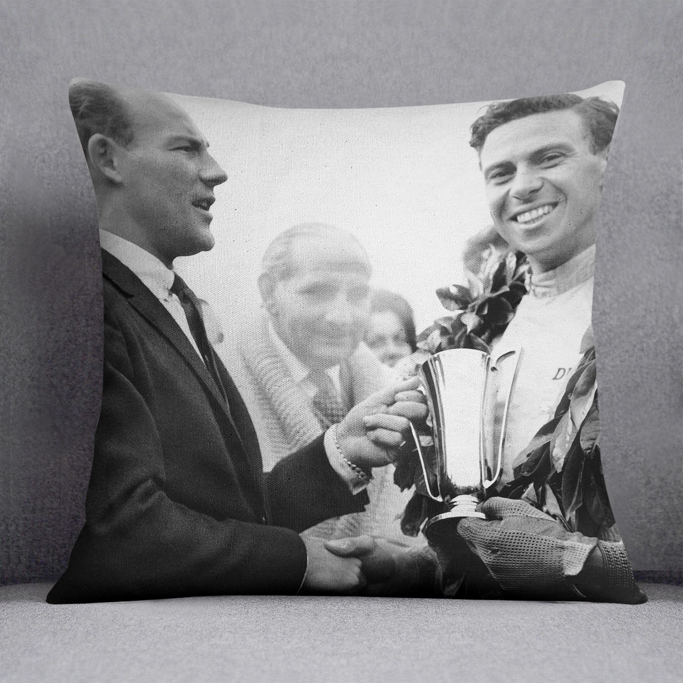 British racing drivers Jim Clark and Stirling Moss Cushion