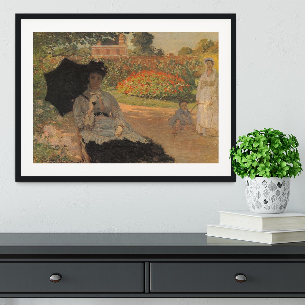Camille in the garden with Jean and his nanny by Monet Framed Print - Canvas Art Rocks - 1