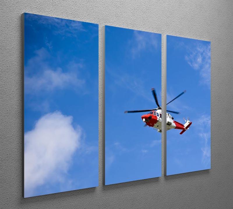 Coastguard helicopter in the blue sky 3 Split Panel Canvas Print - Canvas Art Rocks - 2