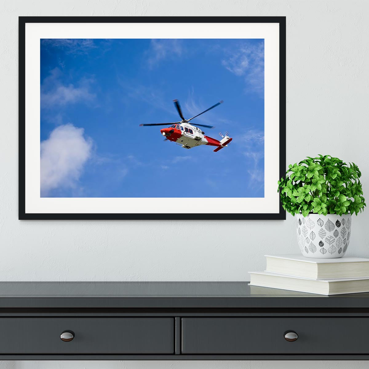 Coastguard helicopter in the blue sky Framed Print - Canvas Art Rocks - 1