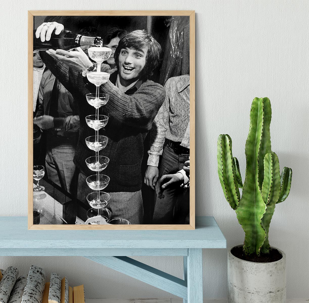 George Best pouring champagne Framed Print - Canvas Art Rocks - 4