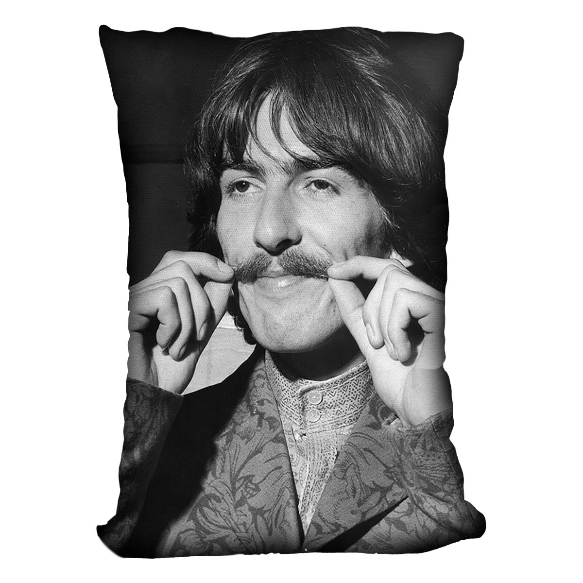 George Harrison plays with his moustache Cushion