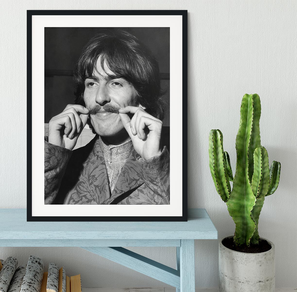 George Harrison plays with his moustache Framed Print - Canvas Art Rocks - 1
