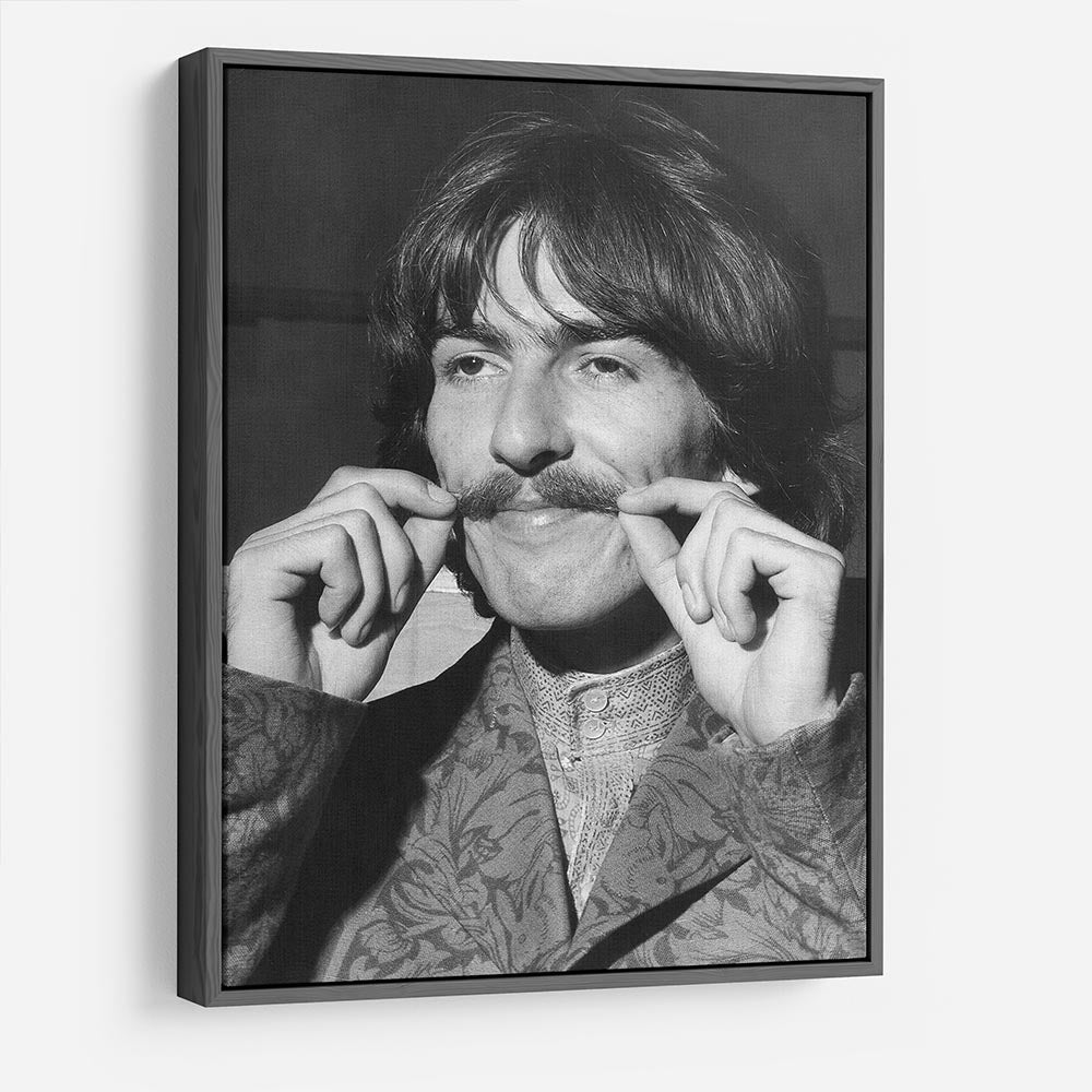 George Harrison plays with his moustache HD Metal Print