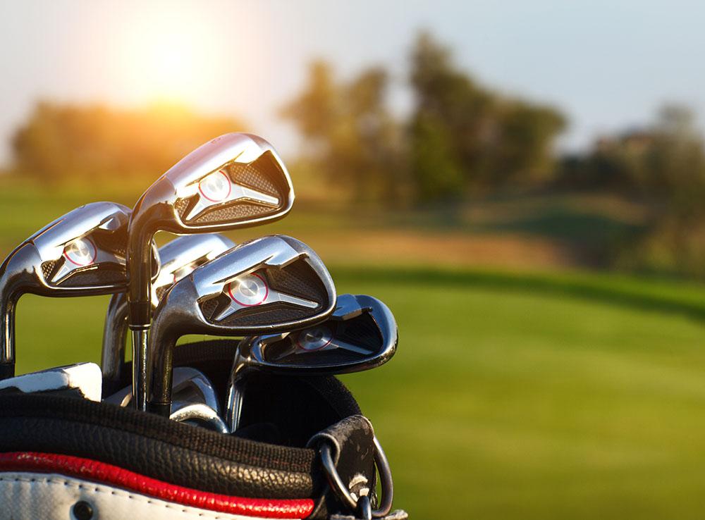 Golf clubs drivers over green Wall Mural Wallpaper - Canvas Art Rocks - 1