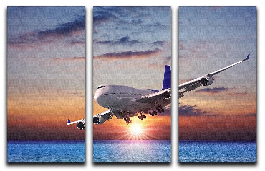 Jet liner over the sea at dusk 3 Split Panel Canvas Print - Canvas Art Rocks - 1