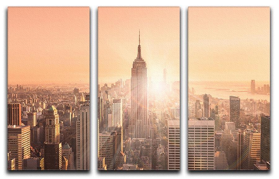 Manhattan downtown skyline with illuminated Empire State Building 3 Split Panel Canvas Print - Canvas Art Rocks - 1