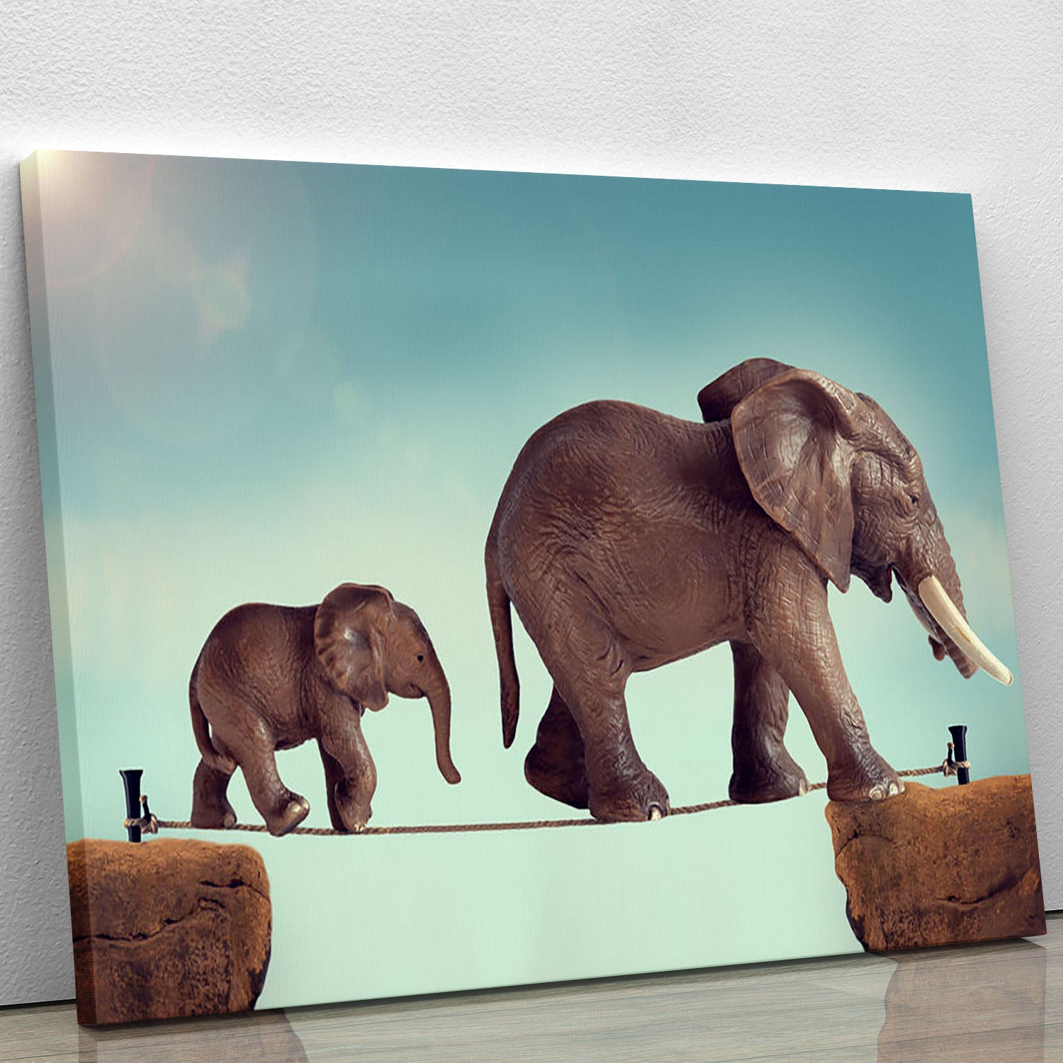 Mother and baby elephant on a tightrope Canvas Print or Poster - Canvas Art Rocks - 1