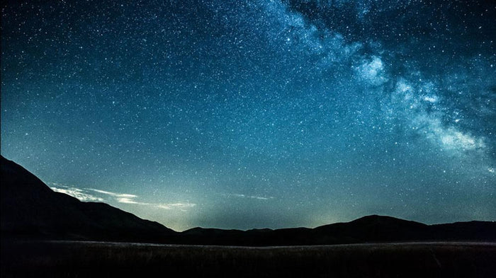 Night sky with stars milky way over mountains Wall Mural Wallpaper