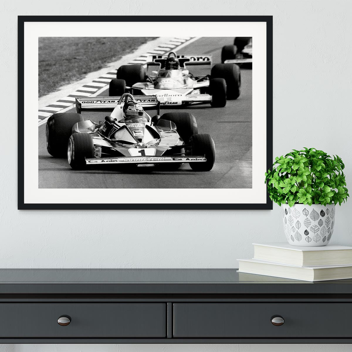 Niki Lauda leads James Hunt in the British Grand Prix 1976 Framed Print - Canvas Art Rocks - 1