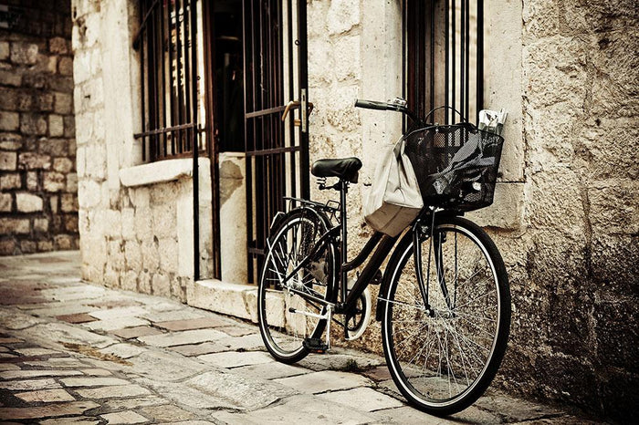 Old bicycle with basket Wall Mural Wallpaper