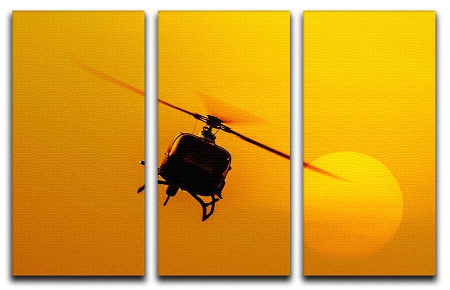 Patrol helicopter flying in sunset 3 Split Panel Canvas Print - Canvas Art Rocks - 1