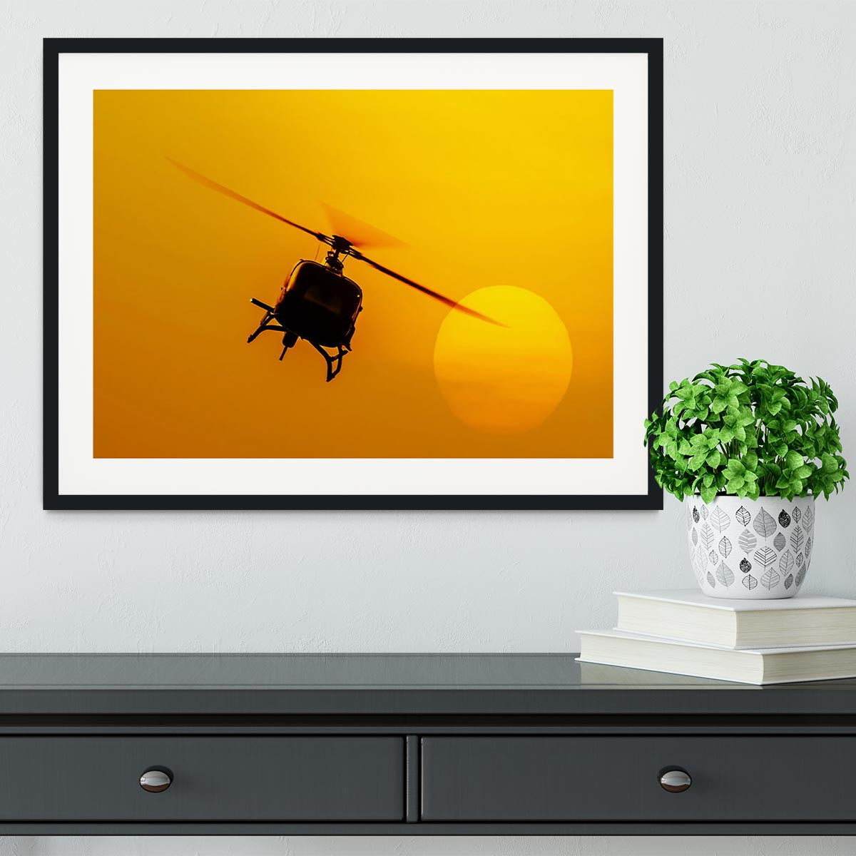 Patrol helicopter flying in sunset Framed Print - Canvas Art Rocks - 1