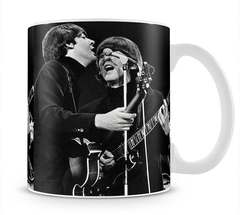Paul McCartney and George Harrison on stage Mug - Canvas Art Rocks - 1
