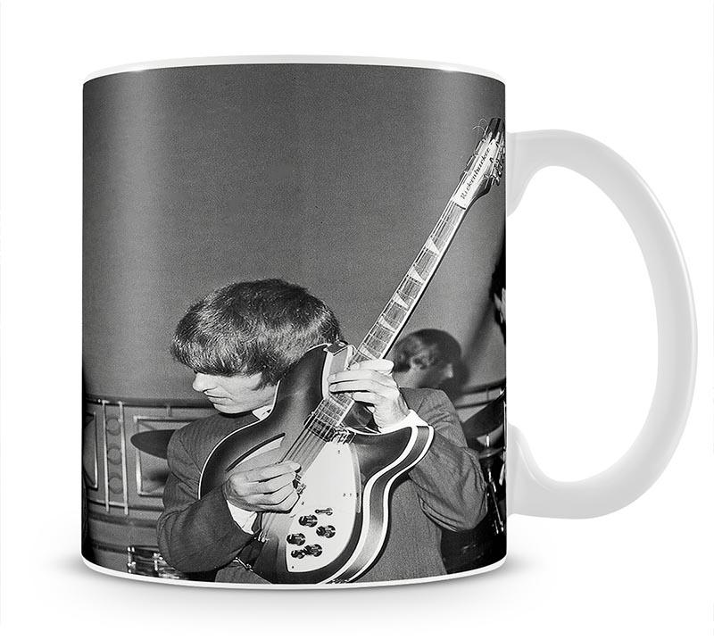 Paul McCartney and George Harrison tune their guitars Mug - Canvas Art Rocks - 1