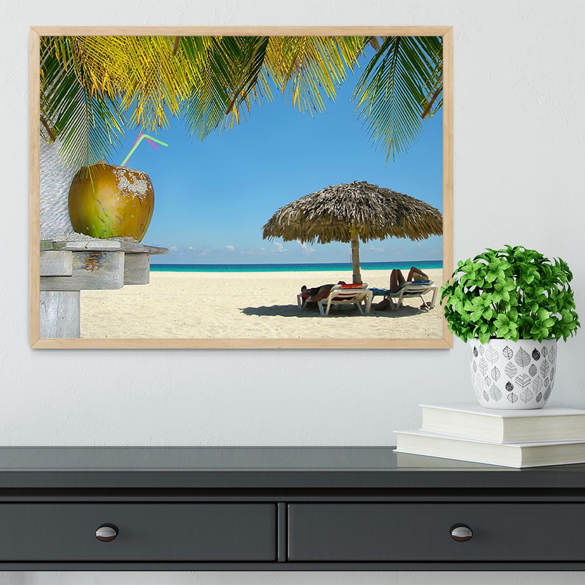People relaxing under tropical huts with coconut Framed Print - Canvas Art Rocks - 4
