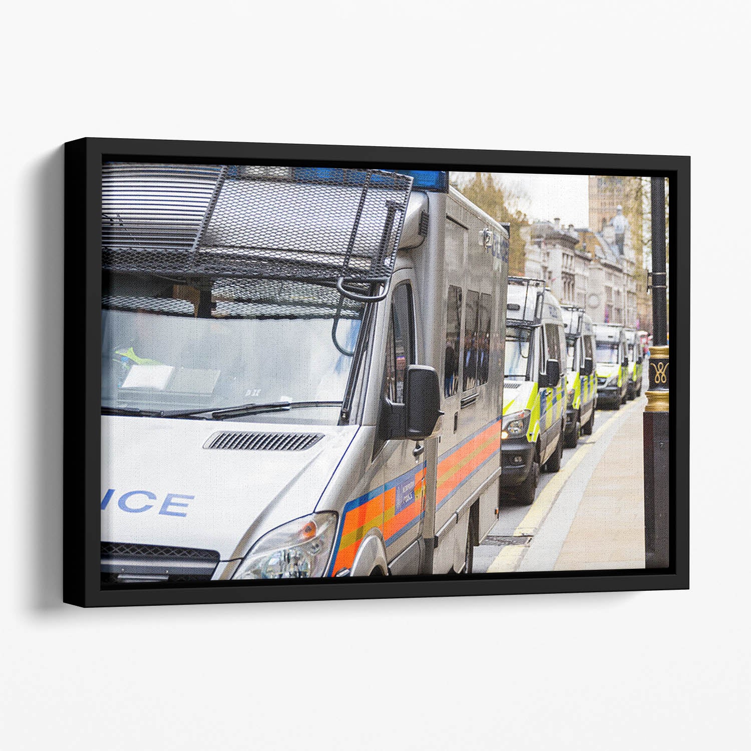 Police vans in a row Floating Framed Canvas