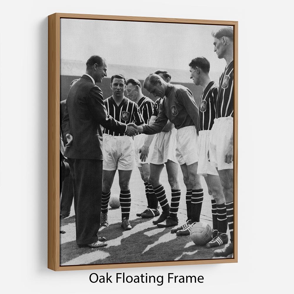 Prince Philip meeting members of Manchester City team Floating Frame Canvas