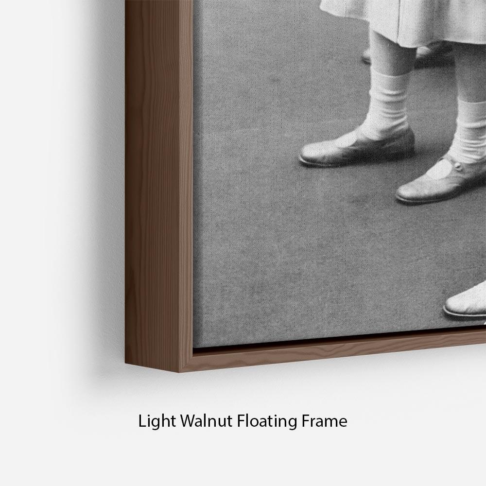 Queen Elizabeth II as a child with her sister in matched outfits Floating Frame Canvas